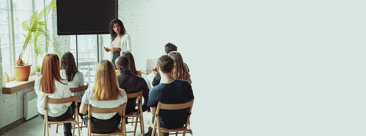 Psychologist from Mindsight Clinic with students teaching how to perform counselling course