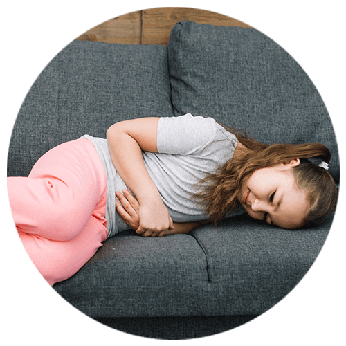 Girl lying down on the sofa with loss of interest in activities in need of a child psychologist for child counselling